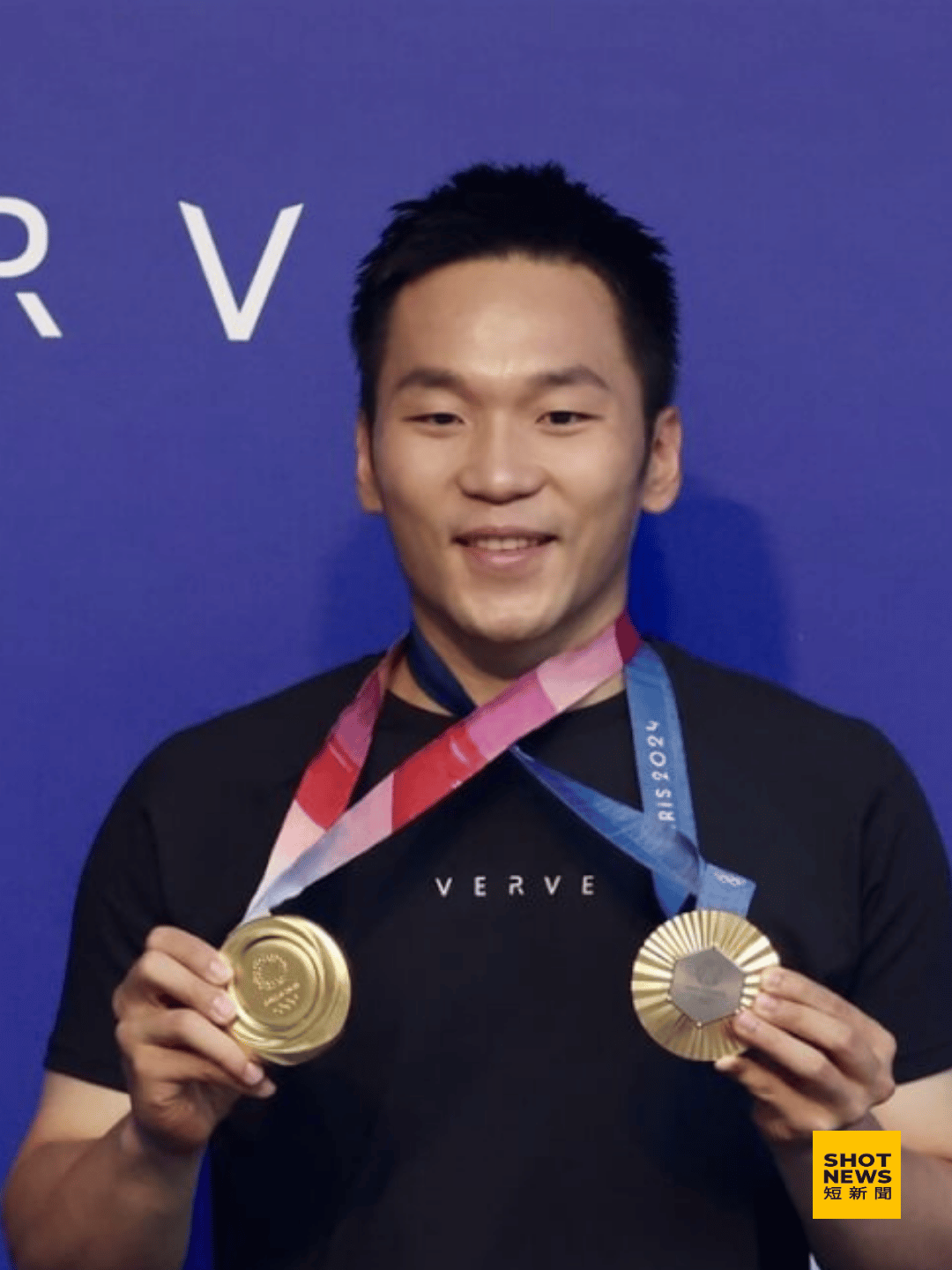 運動部長李洋，於巴黎奧運會上秀出奪得兩屆男子雙人羽球金牌。(中央社)